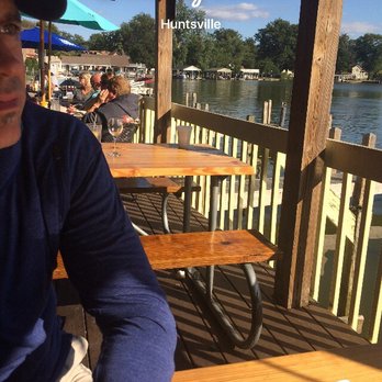 Cranberry Resort - The back deck seating with adjacent docks to the right - American Near Me - Huntsville, Ohio