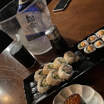 Sushi Rock - Cali roll with toasted sesame seeds. Octopus roll. Very good.  Also ordered special scallop roll and it was delicious too. - Japanese Near Me - Dallas, Texas
