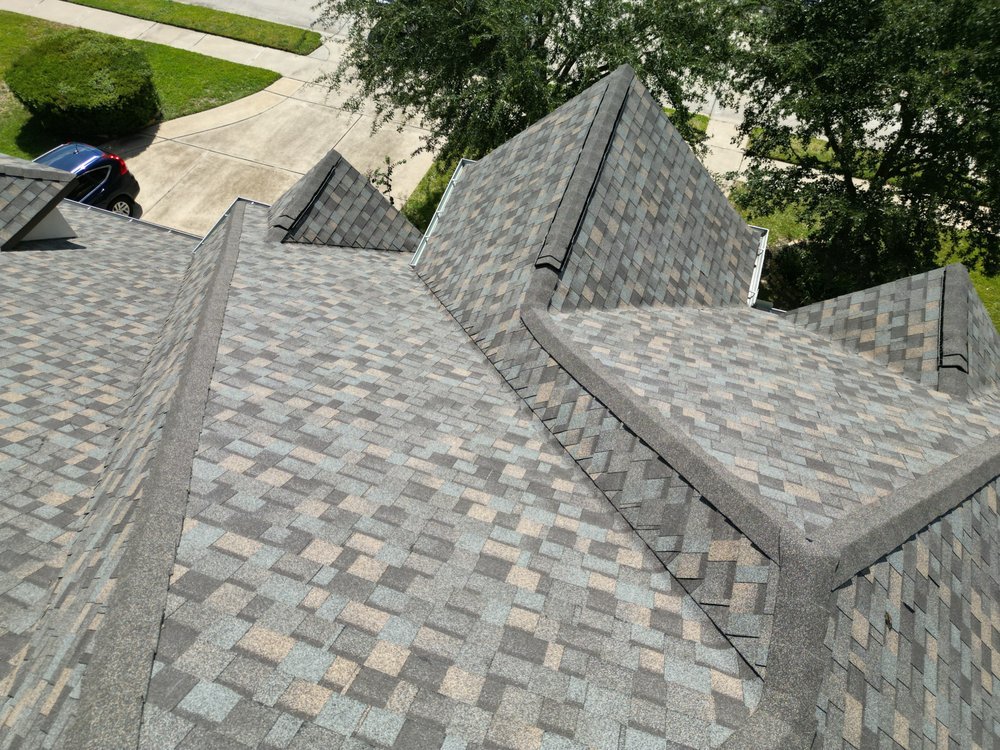 Slide of Core Four Roofing