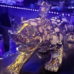 A big gold jaguar. A big gold jaguar.
