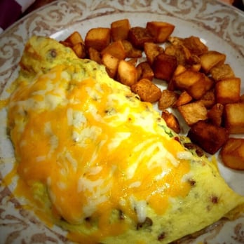 Another Broken Egg Cafe - The supreme omelette with potatoes. This was delicious - Breakfast & Brunch Near Me - Indianapolis, Indiana