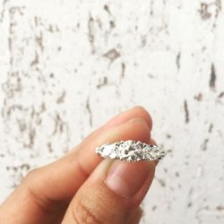 Bravo Jewellers - Voted Best Local Jewelry Store - A harmoniously balanced round &  shape ~Three stone Wedding ring set in Platinum!