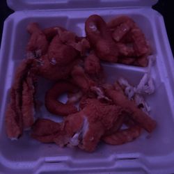 Tides Inn Steak & Seafood - Wtf is this. Keep in my I ordered shrimp and frog legs and I did not touch this. And this is what I received .