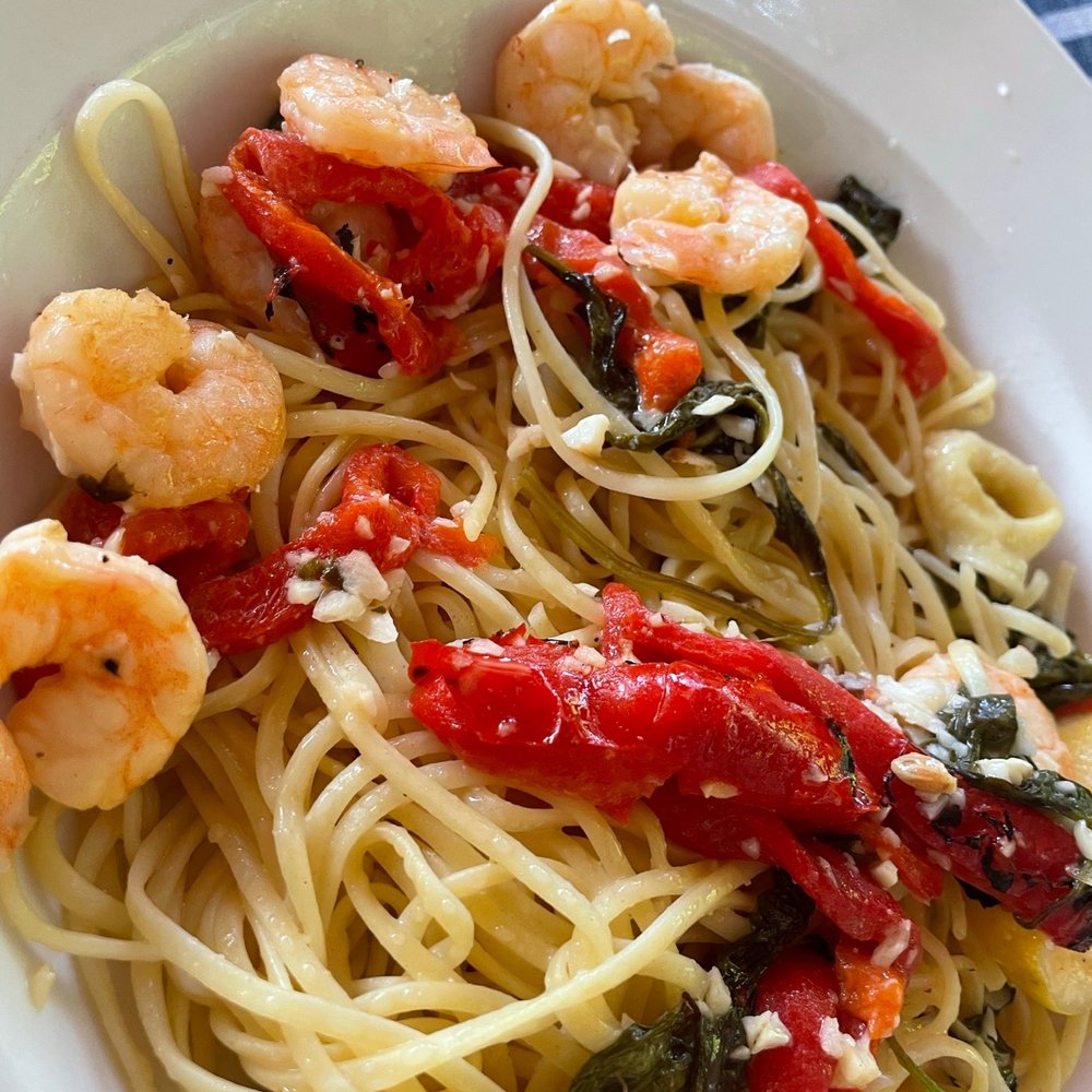 Adirondack Hotel - Shrimp Scampi: Sauced jumbo shrimp with roasted red peppers, spinach and garlic lossed with linguini - Hotels Near Me - Long Lake, New York