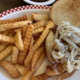 Made to order build your own burger (swiss, cheddar cheese, grilled onions, and crispy bacon) with well done french fries.