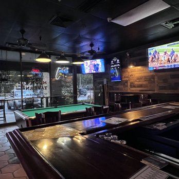 Moon's Tavern - a pool table and televisions - Pubs Near Me - Boca Raton, Florida