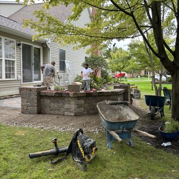Suncraft - Adding the final touches to our new brick paver patio with a fire pit!! - General Contractors Near Me - Columbus, Ohio Suncraft - Adding the final touches to our new brick paver patio with a fire pit!! - General Contractors Near Me - Columbus, Ohio