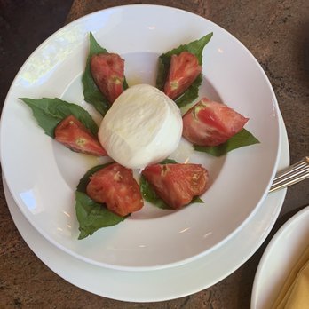 Romul's - Local heirloom tomato caprese salad with burrata - Italian Near Me - Hood River, Oregon Romul's - Local heirloom tomato caprese salad with burrata - Italian Near Me - Hood River, Oregon