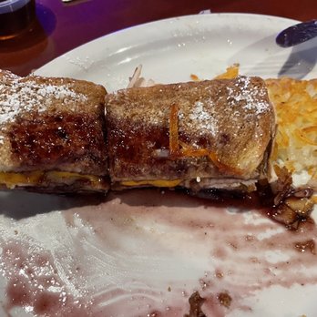 Corner Pocket Bar and Grill - Monte Cristo sandwich with Marionberries syrup (half eaten) delicious - Breakfast & Brunch Near Me - Salem, Oregon