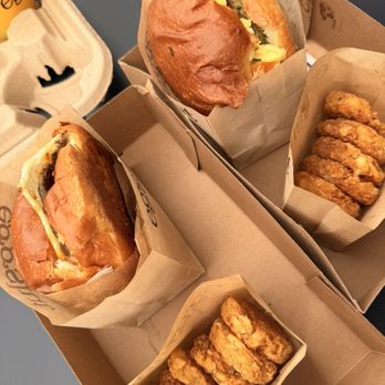 Eggslut - Left to right: sausage, egg, and cheese, Fairfax, and truffle hashbrowns - Breakfast & Brunch Near Me - Atlanta, Georgia