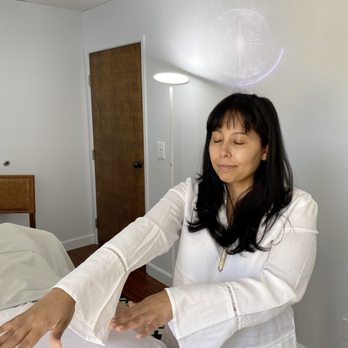Crysta Luna - Reiki practitioners use a technique called palm healing or hands-on healing through which a "universal life force". - Reiki Near Me Crysta Luna - Reiki practitioners use a technique called palm healing or hands-on healing through which a "universal life force". - Reiki Near Me