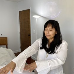 Crysta Luna - Reiki practitioners use a technique called palm healing or hands-on healing through which a "universal life force".