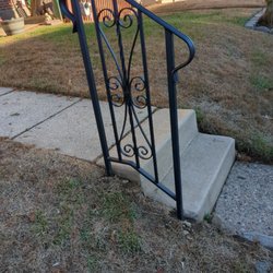 Anvil Iron Works - Here is the beautiful railing cemented next to the existing steps! We LOVE it!