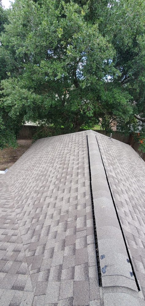 Slide of Truly Roofing & Construction