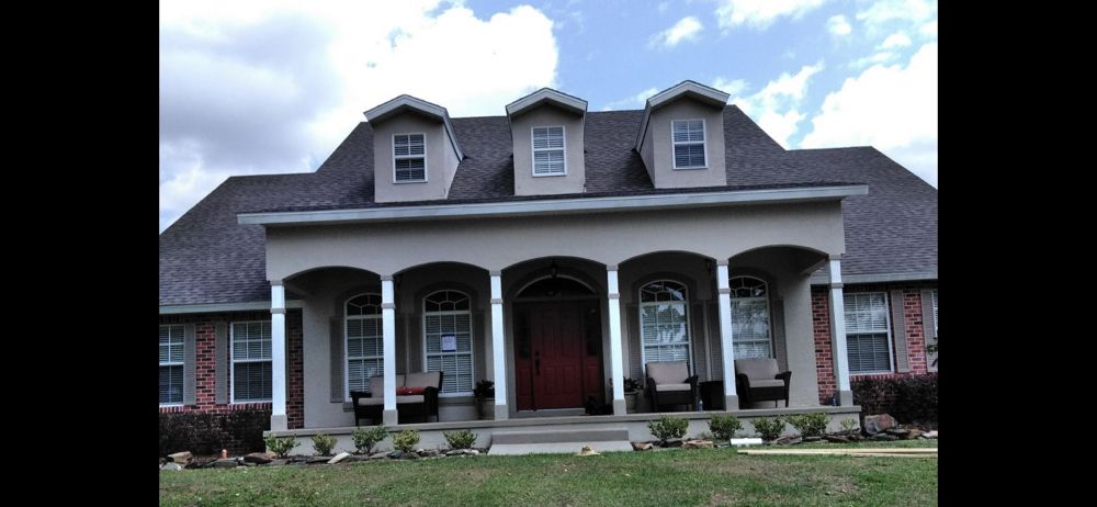 Slide of Belcher Roofing