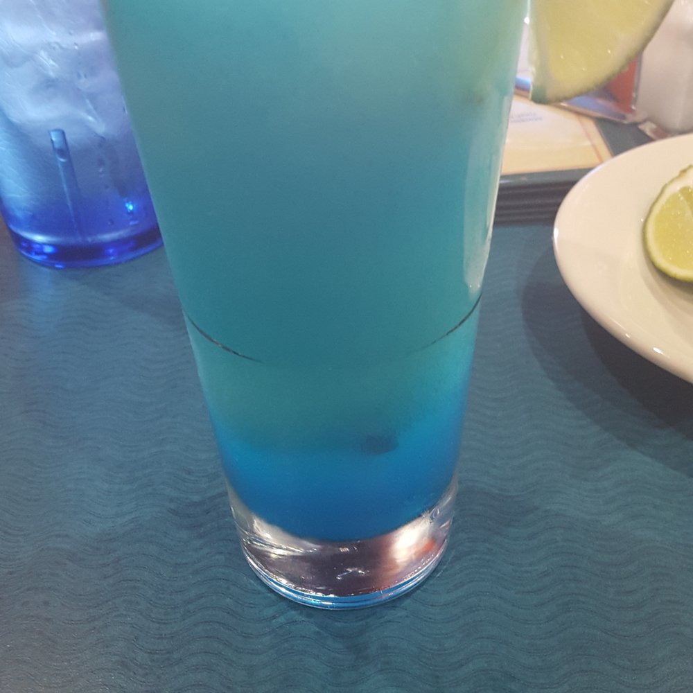 Serranos - The medium Blue Curacao Margarita. - Tex-Mex Near Me - Cedar Park, Texas Serranos - The medium Blue Curacao Margarita. - Tex-Mex Near Me - Cedar Park, Texas