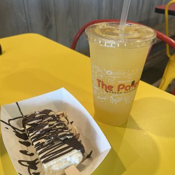 The Paleta Bar - Paleta de coco dipped in chocolate, almonds, and graham cracker.  Mango pineapple Agua - Ice Cream & Frozen Yogurt Near Me - Santa Fe, New Mexico