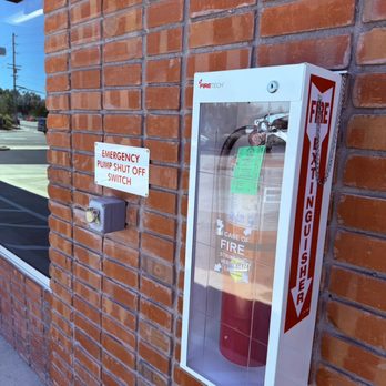 Desert FIRESHIELD - New fire extinguisher with a new fire extinguisher cabinet installed at a gas station. - Fire Protection Services Near Me Desert FIRESHIELD - New fire extinguisher with a new fire extinguisher cabinet installed at a gas station. - Fire Protection Services Near Me