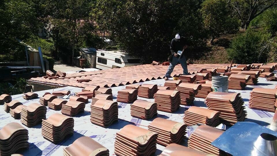 Slide of Tony and Velasco Roofing Constructions