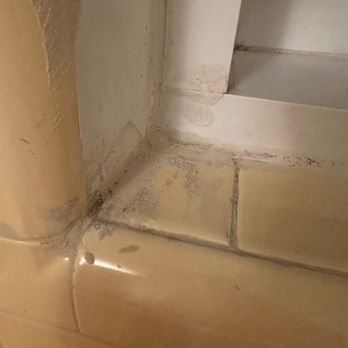The Groutman NYC - a dirty bathtub - Flooring Near Me The Groutman NYC - a dirty bathtub - Flooring Near Me