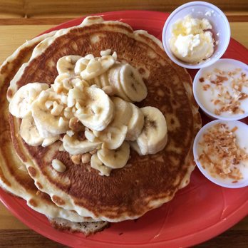 Coconut's Fish Cafe - Kamaole - Mac nut pancakes with bananas and coconut syrup!  Delicious! - Seafood Near Me - Kihei, Hawaii