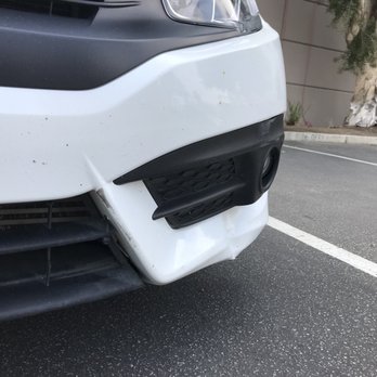Seidner's Collision Center - Before Photo: Front Grill Torn Off (held in place with cable ties). - Body Shops Near Me - Corona, California