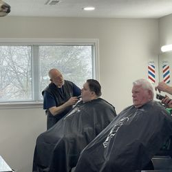 Harvester Barber Shop - My nephew.... His hair and beard look much better now.