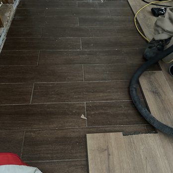 Grace Remodeling - Pulled flooring showing lack of underlayment - General Contractors Near Me Grace Remodeling - Pulled flooring showing lack of underlayment - General Contractors Near Me