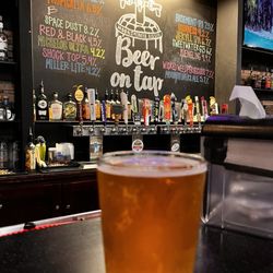 Moonshiners Bar & Grill - G13.  Several beers on draft.
