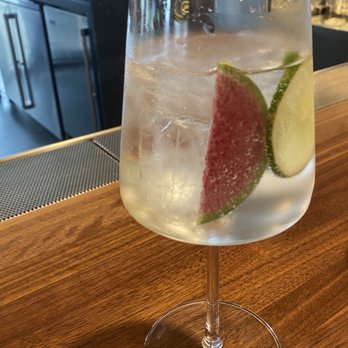 Corrida - Bright gin tonic:  monkey 47 gin, fever tree elderflower tonic, watermelon radish. - Steakhouses Near Me - Boulder, Colorado