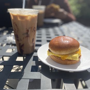 Books and Beans - Egg, cheese and bacon on brioche. Mocha iced coffee. - Coffee & Tea Near Me - Rocky Mount, North Carolina Books and Beans - Egg, cheese and bacon on brioche. Mocha iced coffee. - Coffee & Tea Near Me - Rocky Mount, North Carolina
