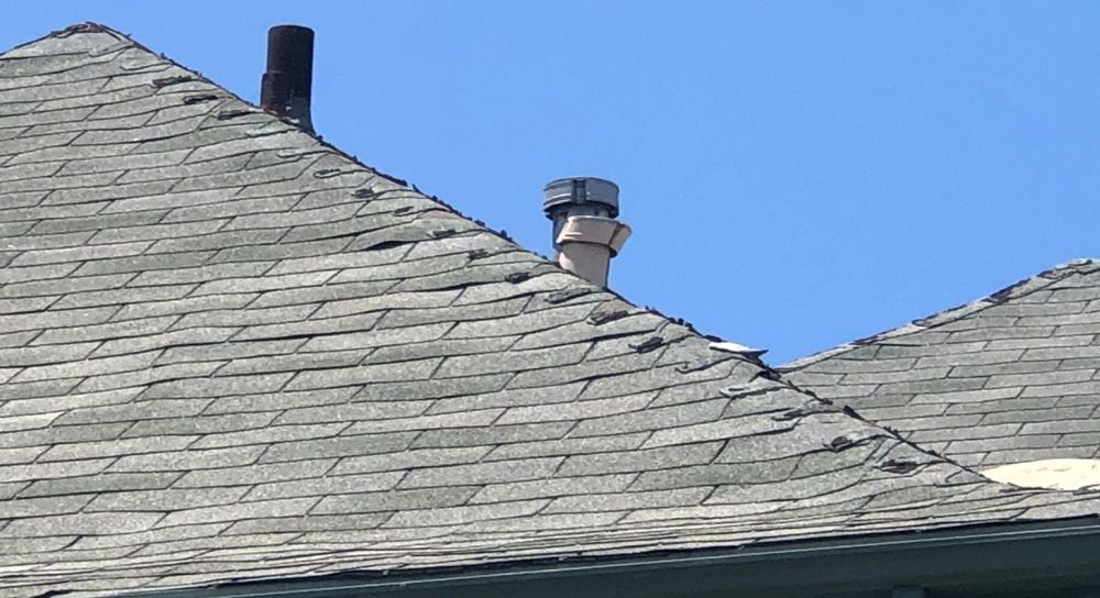 Slide of Bazan Roofing