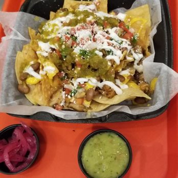 STREET - Taco & Beer - Nachos with pickled onions and verde salsa on the side - Tacos Near Me - Tucson, Arizona STREET - Taco & Beer - Nachos with pickled onions and verde salsa on the side - Tacos Near Me - Tucson, Arizona