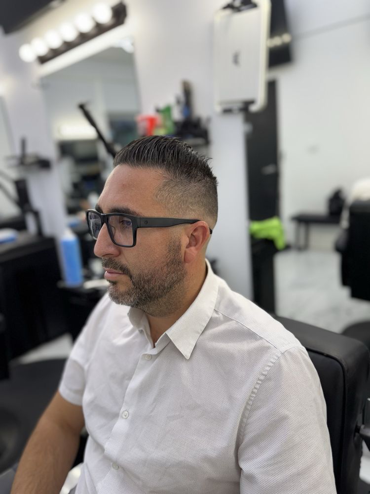 Nelson - BladeNBeat Barber Logo