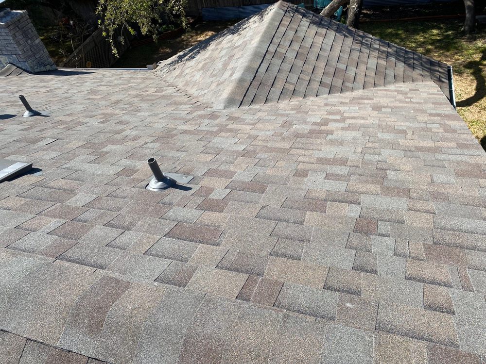 Slide of Texan Roofing Pro