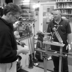 Club Guy Golf - Working with a client to set his loft and lies.