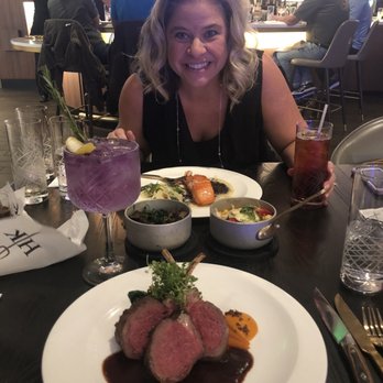 Gordon Ramsay Hell's Kitchen - Entrees of rack of lamb and crispy salmon, with sides of mushrooms and corn - Steakhouses Near Me - Stateline, Nevada