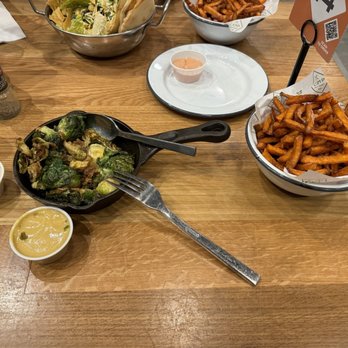 Camp Outpost - Crispy Brussels Sprouts & Sweet Potato Fries - New American Near Me - Springdale, Utah Camp Outpost - Crispy Brussels Sprouts & Sweet Potato Fries - New American Near Me - Springdale, Utah