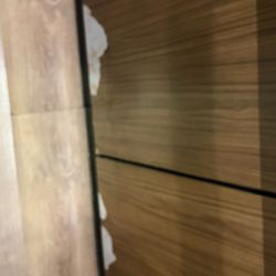Holiday Inn Express & Suites Olathe South - elevator wall peeling off - the lighter color is the floor