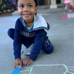 Sunshine House Preschool - Sidewalk masterpieces in the making! Pure joy and creativity during our morning outside play.