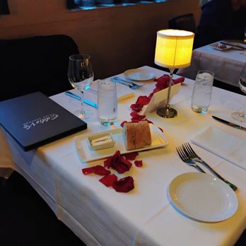 Eddie V's Prime Seafood - Birthday roses on the table - Seafood Near Me - Troy, Michigan Eddie V's Prime Seafood - Birthday roses on the table - Seafood Near Me - Troy, Michigan