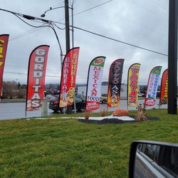 El Sazon Birrieria - Front (promotion flags) of restaurant