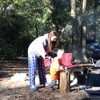 Ichetucknee Springs Campgrounds - Practicing his ax swinging skills (Site 17) - Campgrounds Near Me - Fort White, Florida Ichetucknee Springs Campgrounds - Practicing his ax swinging skills (Site 17) - Campgrounds Near Me - Fort White, Florida