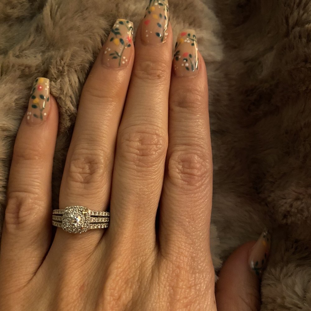 My beautiful spring nails by Tammy!  Free-hand painted on dip.