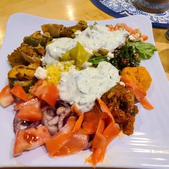 Fevzi Mediterranean Grill - Lamb gyro, chicken kabob, couscous, eggplant, olives, ginger, tomatoes, onions, romaine lettuce, feta cheese, hummus, tzatziki sauce. - Mediterranean Near Me - Cherry Hill, New Jersey Fevzi Mediterranean Grill - Lamb gyro, chicken kabob, couscous, eggplant, olives, ginger, tomatoes, onions, romaine lettuce, feta cheese, hummus, tzatziki sauce. - Mediterranean Near Me - Cherry Hill, New Jersey