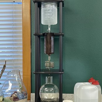 Beads & Grinds - a coffee maker with a glass container - Coffee & Tea Near Me - Buxton, North Carolina Beads & Grinds - a coffee maker with a glass container - Coffee & Tea Near Me - Buxton, North Carolina