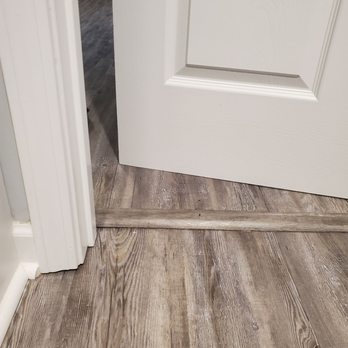 Slaton Custom Homes - a close up of a wood floor - General Contractors Near Me - Huntsville, Alabama