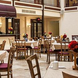 Tables at the Courtyard Restaurant in the basement of the Desoto House.