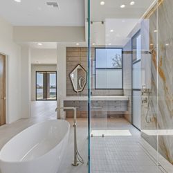 Shower Door Pros - New build spec home walk-in shower enclosure with Starfire clear glass panels.