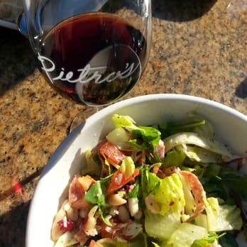 Pietro's - Chopped Antipasto Salad; Glass of Barbera Wine - Italian Near Me - Lodi, California Pietro's - Chopped Antipasto Salad; Glass of Barbera Wine - Italian Near Me - Lodi, California